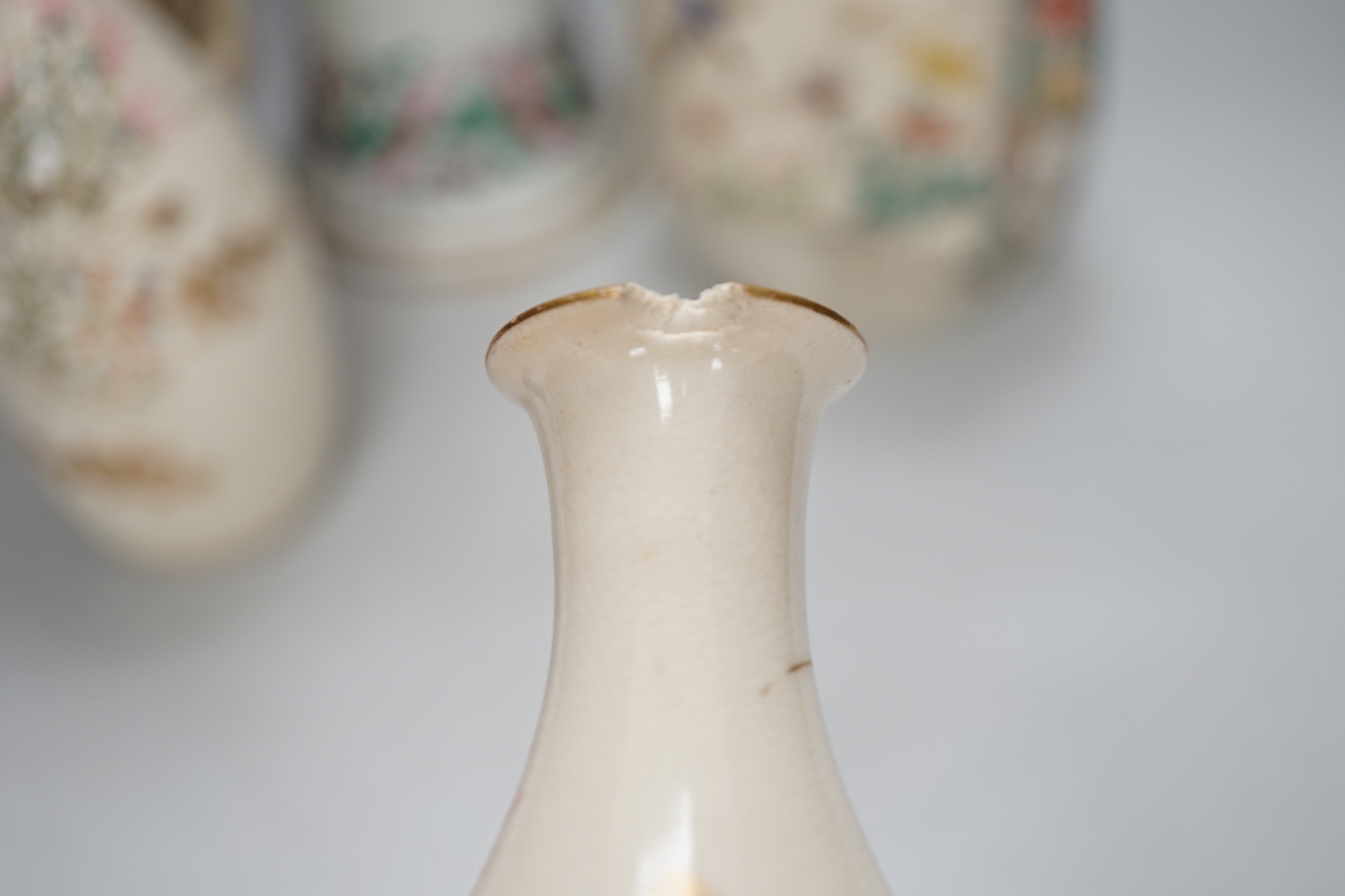 A group of Japanese vases and a Satsuma saucer, 30cm high